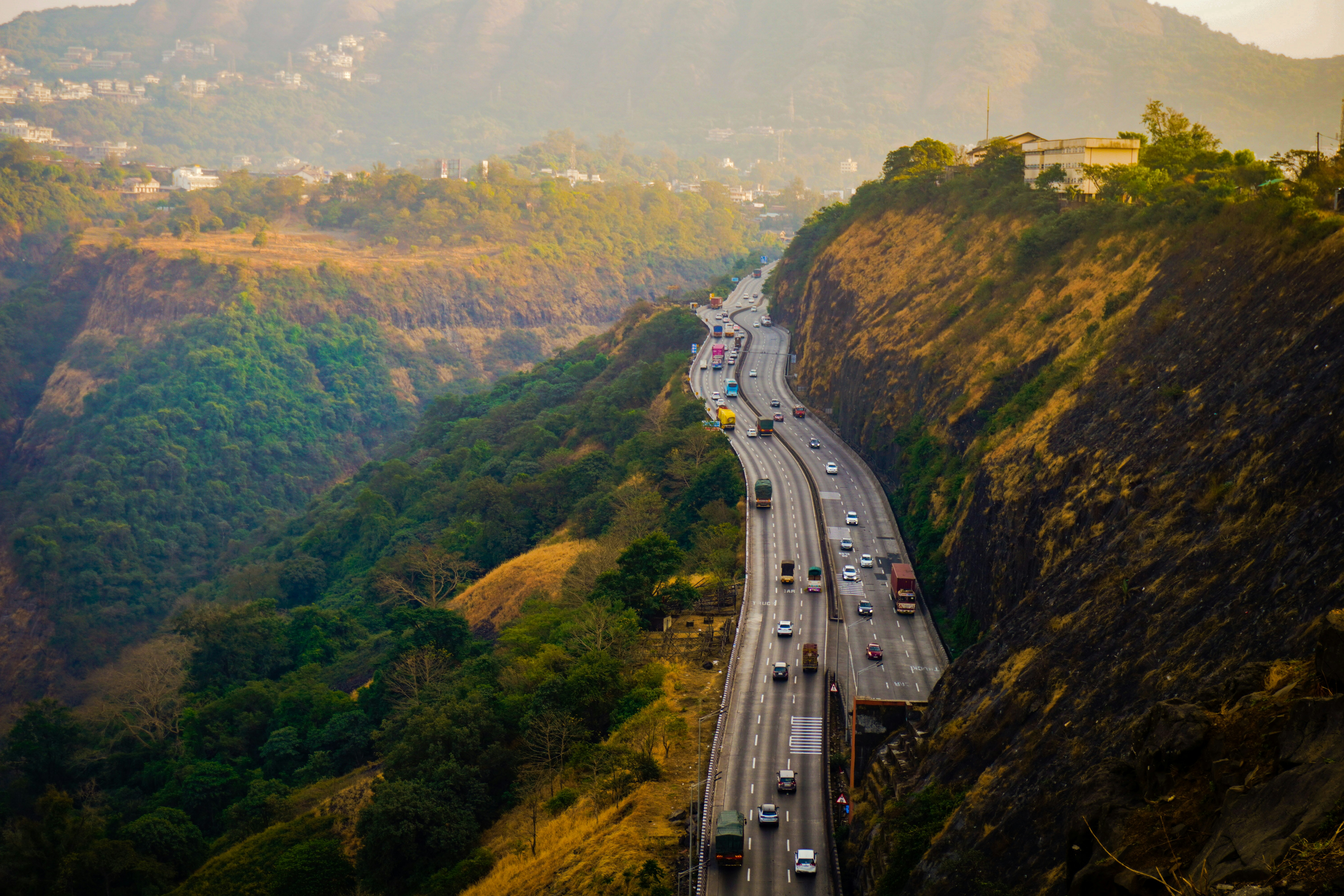 NH 48 highway from Belgaum to Bangalore showing scenic Karnataka landscape for taxi journey